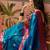 Teal zari woven design saree with contrast unstitched blouse