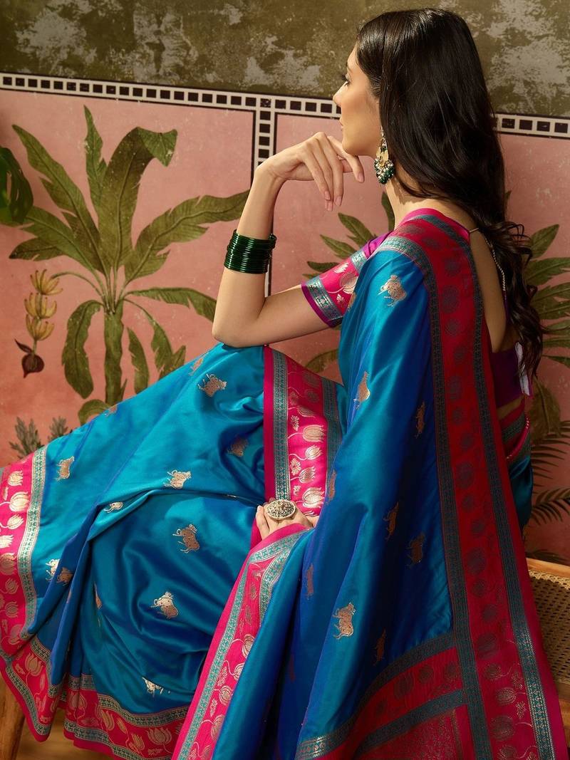 Teal zari woven design saree with contrast unstitched blouse