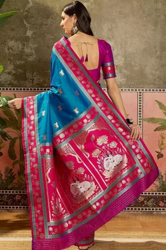 Teal zari woven design saree with contrast unstitched blouse