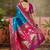 Teal zari woven design saree with contrast unstitched blouse