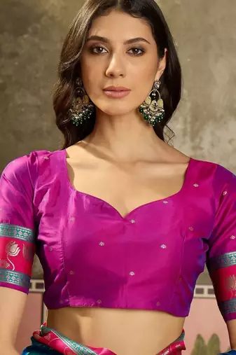 Teal zari woven design saree with contrast unstitched blouse