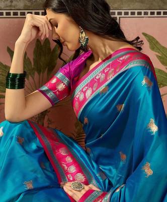 Teal zari woven design saree with contrast unstitched blouse 5