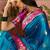 Teal zari woven design saree with contrast unstitched blouse