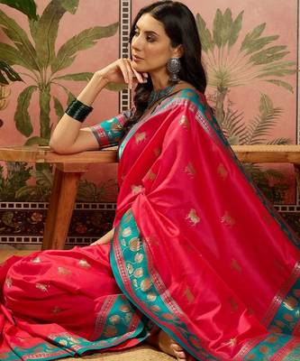 Pink zari woven design saree with contrast unstitched blouse 1