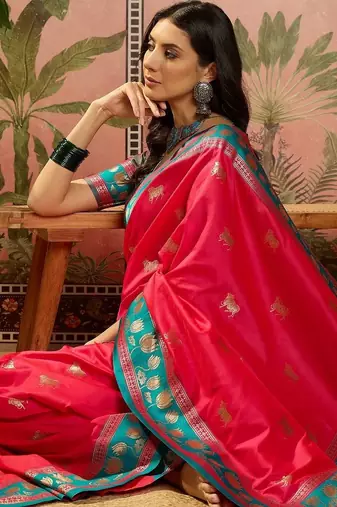 Pink zari woven design saree with contrast unstitched blouse