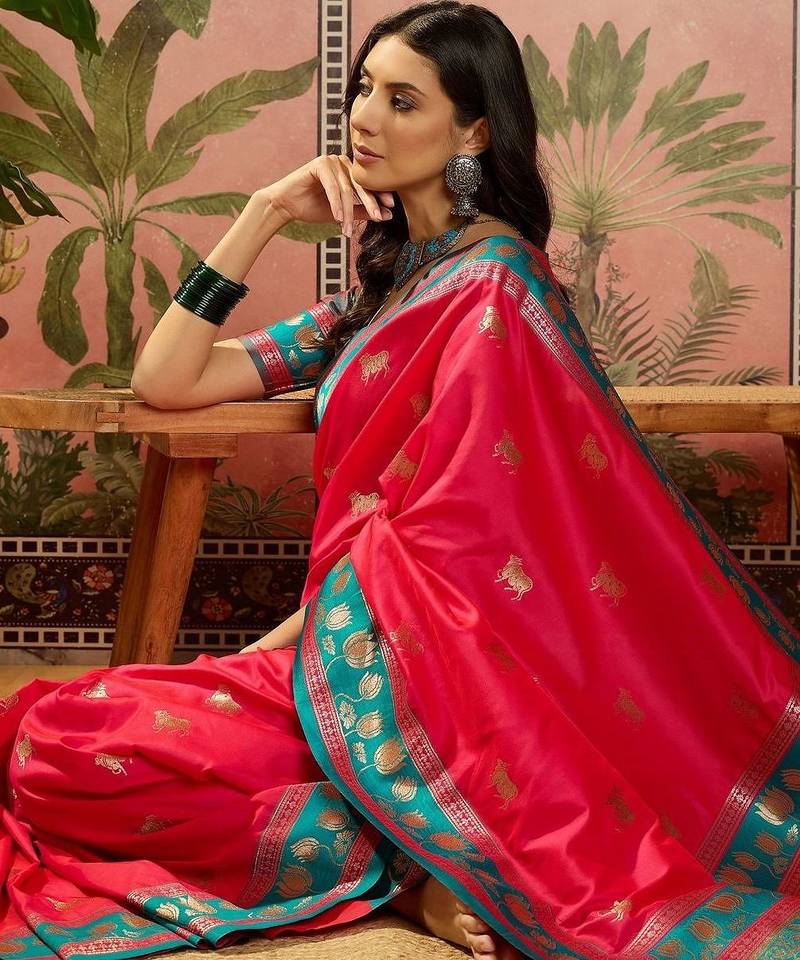 Pink zari woven design saree with contrast unstitched blouse