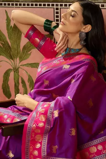 Purple zari woven design saree with contrast unstitched blouse