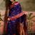 Violet zari woven design saree with contrast unstitched blouse
