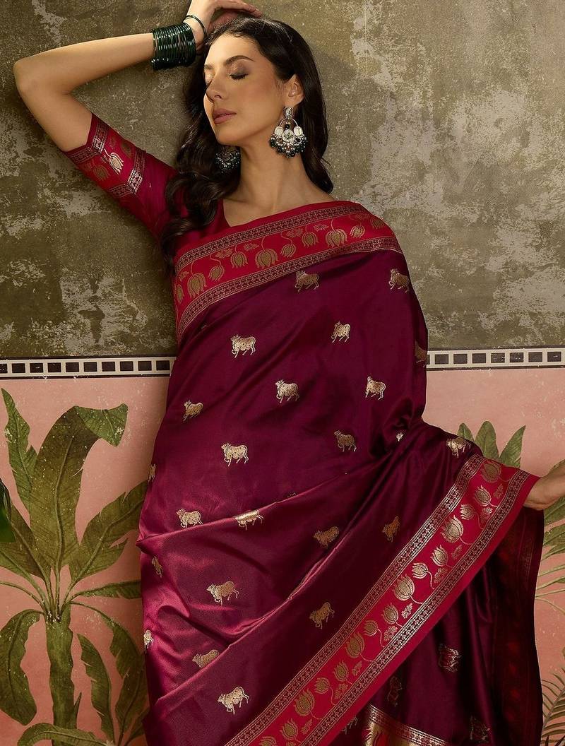 Burgundy zari woven design saree with contrast unstitched blouse