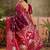 Burgundy zari woven design saree with contrast unstitched blouse