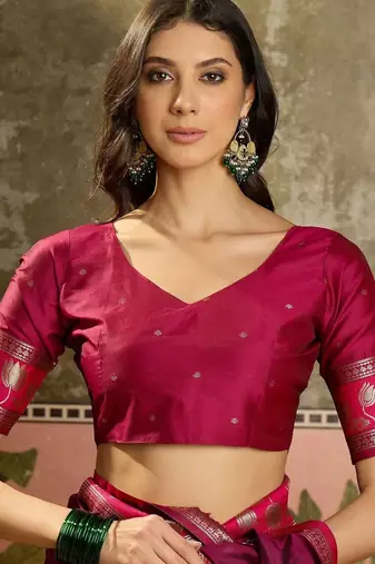 Burgundy zari woven design saree with contrast unstitched blouse