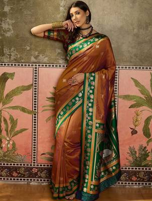 Gold zari woven design saree with contrast unstitched blouse 5