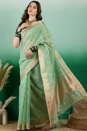 Green ethnic motif zari woven kanjeevaram saree with blouse