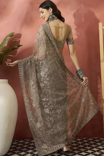 Beige embroidered saree with blouse piece