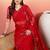 Red embroidered saree with blouse piece