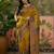 Mustard position printed zari weaving saree with contrast blouse piece