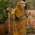 Mustard position printed zari weaving saree with contrast blouse piece