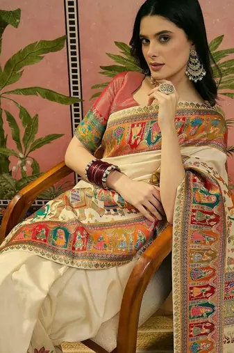 Off white position printed zari weaving saree with contrast blouse piece