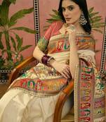 Off white position printed zari weaving saree with contrast blouse piece
