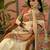 Off white position printed zari weaving saree with contrast blouse piece