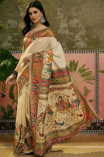Off white position printed zari weaving saree with contrast blouse piece
