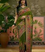 Green position printed zari weaving saree with contrast blouse piece