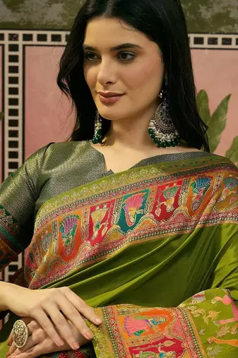 Green position printed zari weaving saree with contrast blouse piece