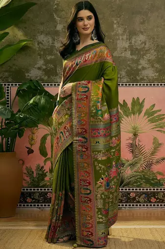 Green position printed zari weaving saree with contrast blouse piece