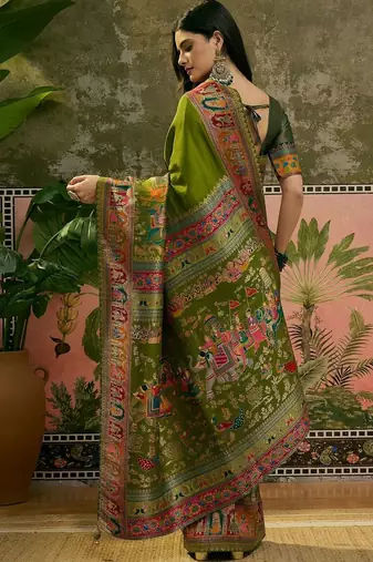 Green position printed zari weaving saree with contrast blouse piece