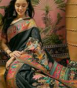 Black position printed zari weaving saree with contrast blouse piece