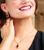 Gold plated red cubic zirconia studded pendant chain drop earrings