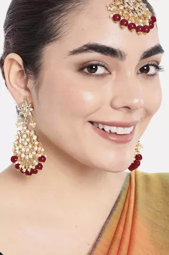 Women's faux kundan maroon pearl chandbali earrings with maang tikka jewelry