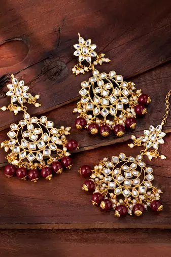 Women's faux kundan maroon pearl chandbali earrings with maang tikka jewelry