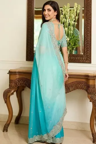 Blue embroidered sarees with unstitched blouse piece