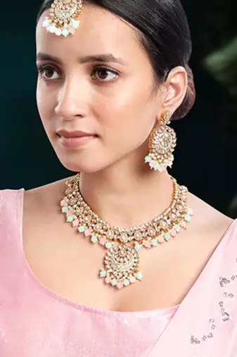 Gold plated mint & pink kundan & beads studded necklace earrings