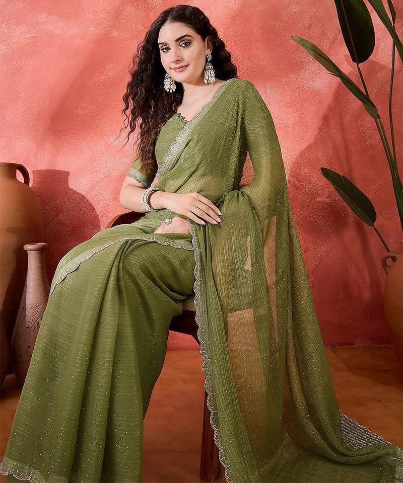 Sea green embellished saree with blouse piece