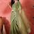 Sea green embellished saree with blouse piece