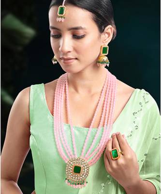 Gold plated pink & green kundan beads and synthetic stone studded 1