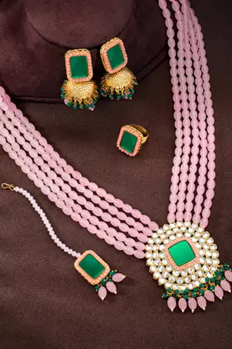 Gold plated pink & green kundan beads and synthetic stone studded