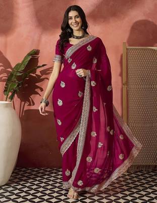 Pink ethnic motifs embellished  georgette saree 1