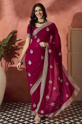 Pink ethnic motifs embellished  georgette saree