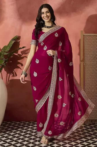 Pink ethnic motifs embellished  georgette saree