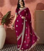 Pink ethnic motifs embellished  georgette saree