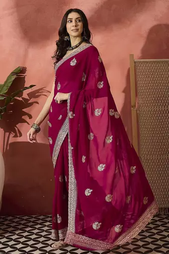 Pink ethnic motifs embellished  georgette saree