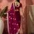 Pink ethnic motifs embellished  georgette saree