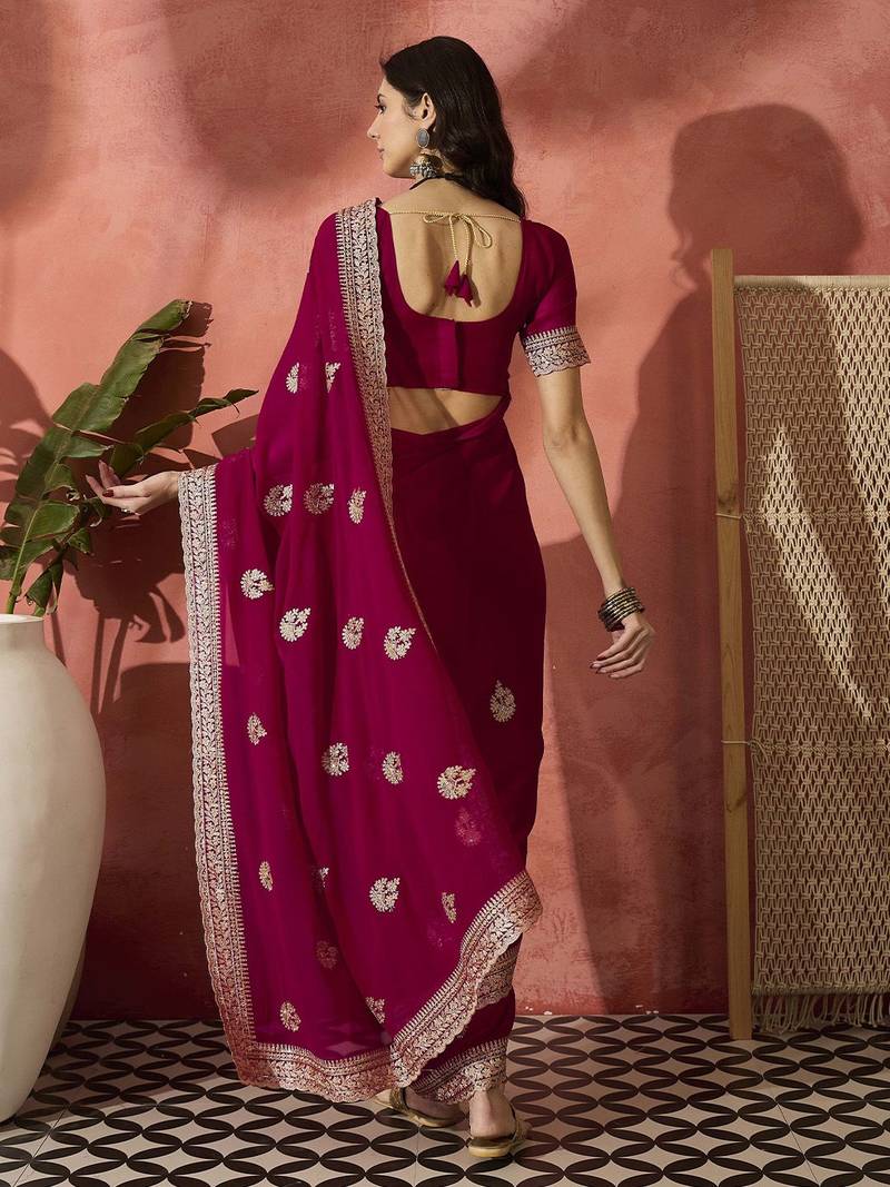 Pink ethnic motifs embellished  georgette saree