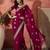 Pink ethnic motifs embellished  georgette saree
