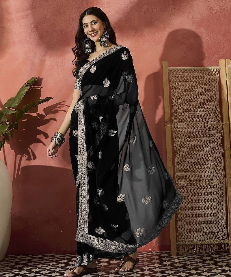 Black ethnic motifs embroidered saree