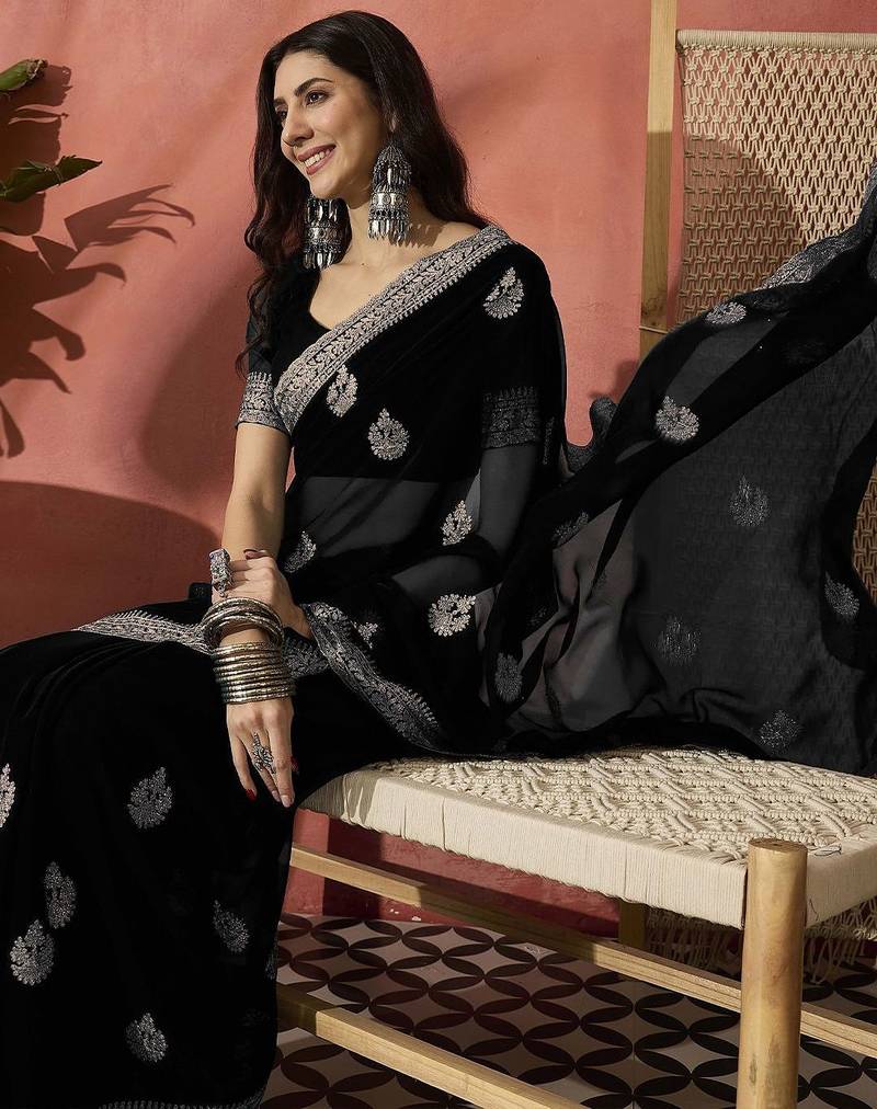 Black ethnic motifs embroidered saree