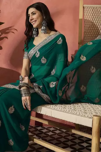 Green ethnic motifs embroidered saree